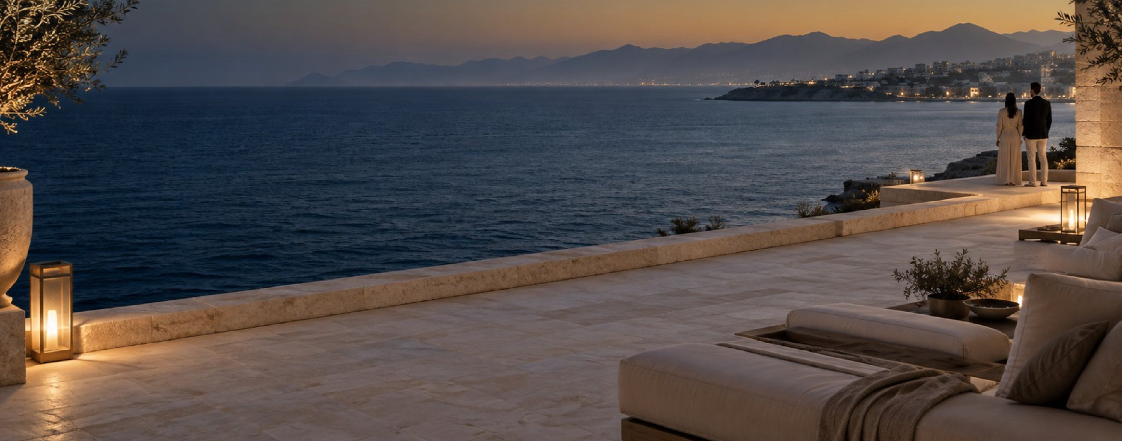 A stone terrace above the Ras Al Khaimah coastline at dusk